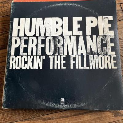 Vintage vinyl records—mostly 70s and 80s—talking Heads, Bruce Springsteen, Bob Dylan, Cheap Trick, The Clash, Roxy Music, Prince, Little...