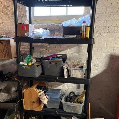 lots of basement stuff: tools, holiday decor, Christmas, Halloween, shelves, wreaths, picture frames, candles, kitchen and more