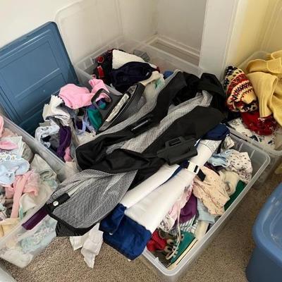 Upstairs: clothing, shoes, lots of nice baby clothes, art and craft supplies, beds, linens, dressers, TVs