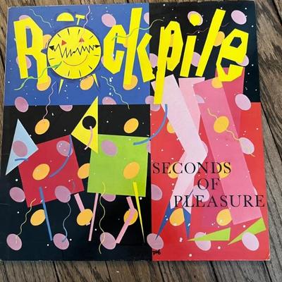 Vintage vinyl records—mostly 70s and 80s—talking Heads, Bruce Springsteen, Bob Dylan, Cheap Trick, The Clash, Roxy Music, Prince, Little...