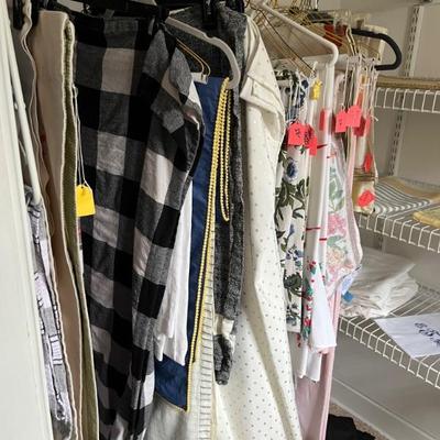Upstairs: clothing, shoes, lots of nice baby clothes, art and craft supplies, beds, linens, dressers, TVs