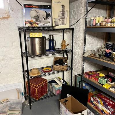 lots of basement stuff: tools, holiday decor, Christmas, Halloween, shelves, wreaths, picture frames, candles, kitchen and more