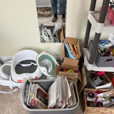 Upstairs: clothing, shoes, lots of nice baby clothes, art and craft supplies, beds, linens, dressers, TVs