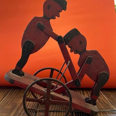 Antique wooden pull toy, railroad handcar
