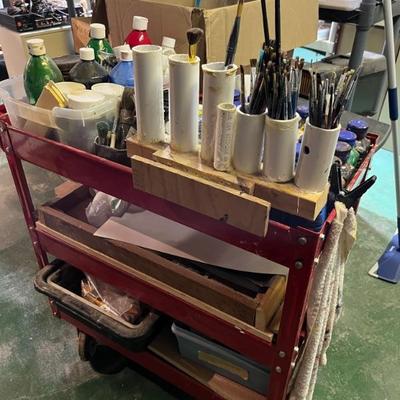 loads of art supplies, found objects, tools, etc