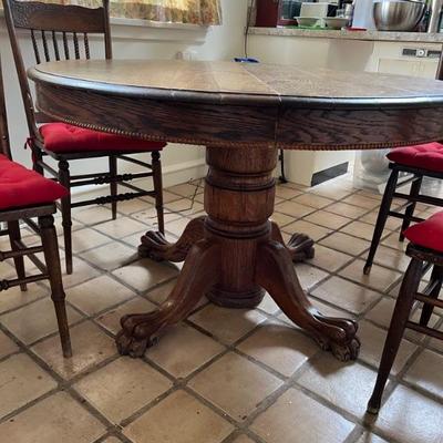 Round antique oak table with 4 chairs