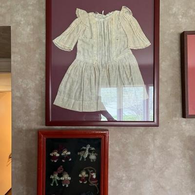 framed antique baby dresses