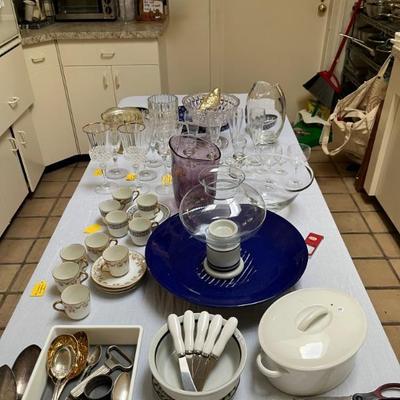 lots of kitchen stuff, nice steel pans, KitchenAid mixers, lots of dishes, small utensils, etc