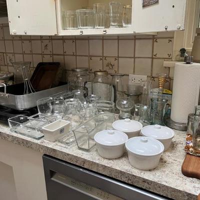 lots of kitchen stuff, nice steel pans, KitchenAid mixers, lots of dishes, small utensils, etc