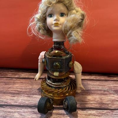 Doll sculptures by Stuart Novy, folk art, outsider art, steampunk, made from doll parts and other found objects (I think they are kinda...