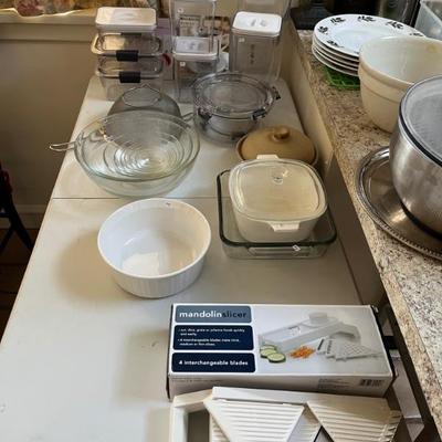 lots of kitchen stuff, nice steel pans, KitchenAid mixers, lots of dishes, small utensils, etc