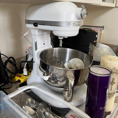 lots of kitchen stuff, nice steel pans, KitchenAid mixers, lots of dishes, small utensils, etc