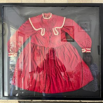 framed antique child's dresses, there are several