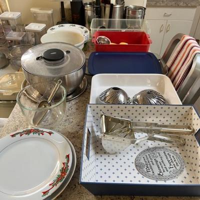 lots of kitchen stuff, nice steel pans, KitchenAid mixers, lots of dishes, small utensils, etc