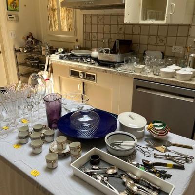 lots of kitchen stuff, nice steel pans, KitchenAid mixers, lots of dishes, small utensils, etc