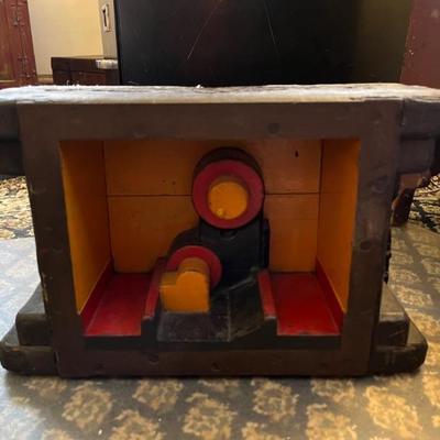 kind of an abstract folk art piece, it might be signed, it's heavy as hell, but it's very cool