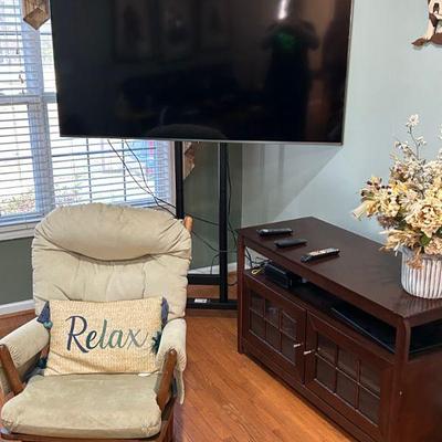 Flat Screen on Rolling Mount. Entertainment Center. Glider Rocker w/ Ottoman. 