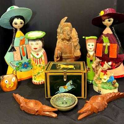 Eclectic Mix of Decor Featuring Paper Mache’ Folk Art Figurines . 
