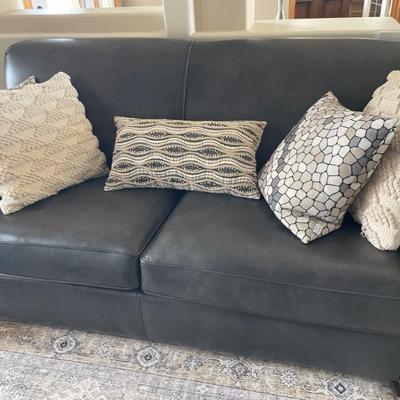 Black leather pull out sofa