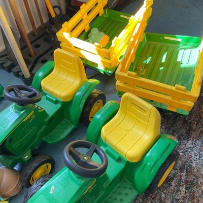 Kids ride on tractors with trailers