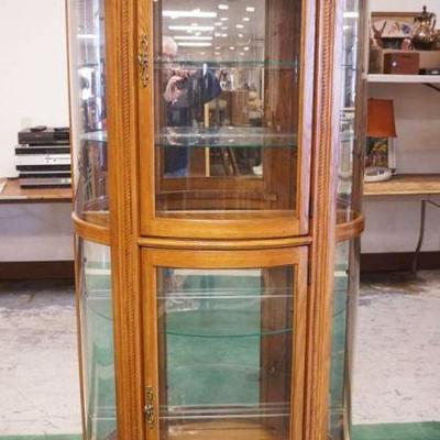 1183	PULASKI OAK CURVED GLASS CHINA CABINET, APPROXIMATELY 39 IN X 18 IN X 77 IN H
