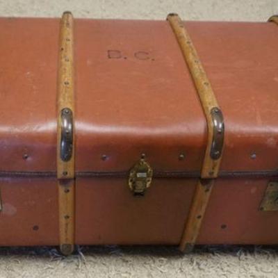 1153	ENGLISH TRAVEL TRUNK HARRODS LTD, APPROXIMATELY 20 IN X 33 IN X 15 IN H, HAS WOOD RIBS AND BRASS HARDWARE
