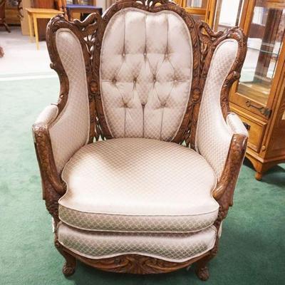 1202	ORNATE CARVED MAHOGANY UPHOLSTERED WING BACK ARM CHAIR WITH CARVED SWAN NECKS AND FLOWERS THROUGHOUT, TUFTED UPHOLSTERY BACK,...