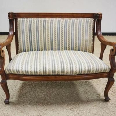 Sale Photo Thumbnail #199: 1200	MAHOGANY UPHOLSTERED EMPIRE STYLE SCROLLED ARM LOVE SEAT, APPROXIMATELY 45 IN X 24 IN X 36 IN H, SOME STAINING ON UPHOLSTERY
