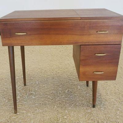1193	MID CENTURY MODERN SINGER SEWING MACHINE, APPROXIMATELY 32 IN X 18 IN X 32 IN H
