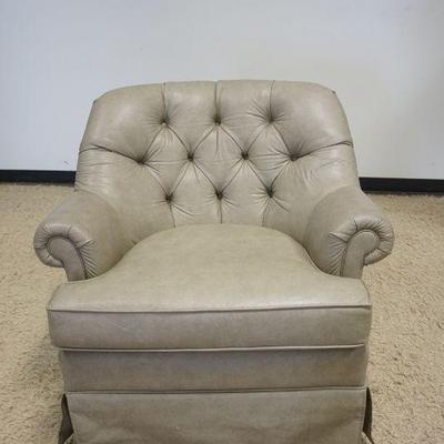 1212	VINYL TUFTED SWIVEL ARM CHAIR
