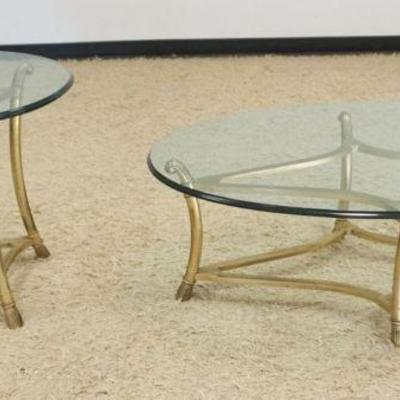 1195	OVAL GLASS TOP COFFEE TABLE AND ROUND LAMP TABLE WITH HEAVY BRASS BASE, COFFEE TABLE APPROXIMATELY 48 IN X 29 IN X 16 IN H, ROUND...