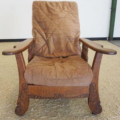 Sale Photo Thumbnail #197: 1198	ANTIQUE OAK MORRIS CHAIR, APPROXIMATELY 34 IN X 33 IN X 25 IN H, BOTTOM SEAT BOARD MISSING
