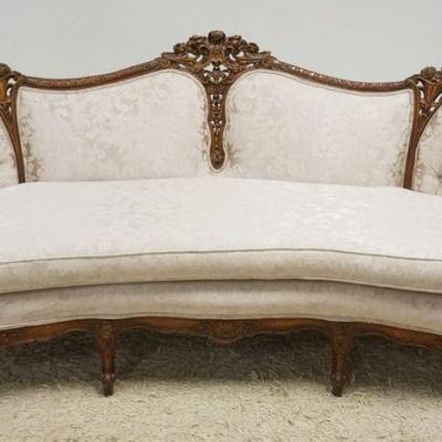 1203	ORNATE PIERCED CARVED WALNUT LOVE SEAT WITH TUFTED UPHOLSTERED SIDE AND CARVED FLOWERS IN URNS AND BIRDS, APPROXIMATELY 84 IN X 36...