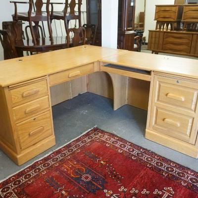 1209	OAK 2 PART L SHAPED DESK WORK STATION WITH 4 DRAWERS, 1 DOOR AND PULL OUT SURFACES, APPROXIMATELY OVERALL 76 IN X 67 IN X 31 D X 25...