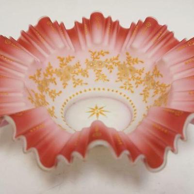 1002	VICTORIAN PINK CASED SATIN GLASS BRIDES BASKET W/RUFFLED EDGE, APPROXIMATELY 11 IN X 4 IN HIGH
