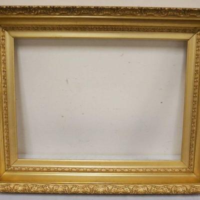 1040	NICE GILT AND GESSO DEEP WELLED ANTIQUE FAME, OUTSIDE APPROXIMATELY 23 IN X 29 IN, INSIDE APPROXIMATELY 23 IN X 16 7/8 IN
