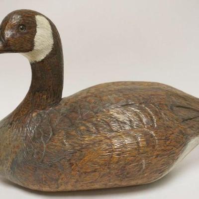 Sale Photo Thumbnail #53: 1053	LARGE CARVED WOOD GOOSE, SIGNED ROBERT LEWIS 1987, APPROXIMATELY 11 IN X 22 IN X 14 IN H
