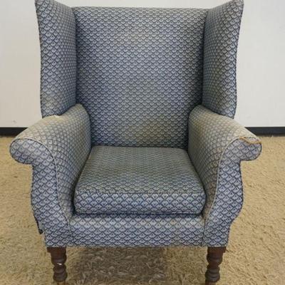 1167	ANTIQUE UPHOLSTERED WING BACK CHAIR, UPHOLSTERY WORN, APPROXIMATELY 34 IN X 28 IN X 35 IN H
