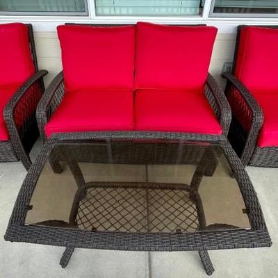 4 Piece Brown Faux Wicker And Metal Patio Set With Red Cushions - Love Seat, 2 Chairs, And Glass Top Table