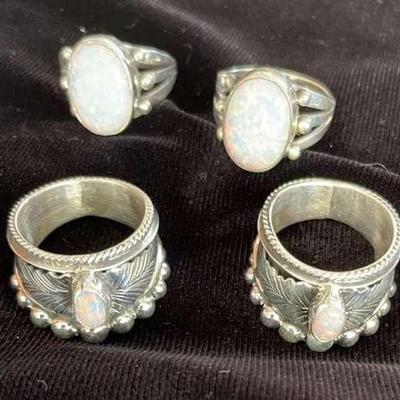 NSJ111 - Four Navajo Hand Crafted Rings Sz 7 With Opal