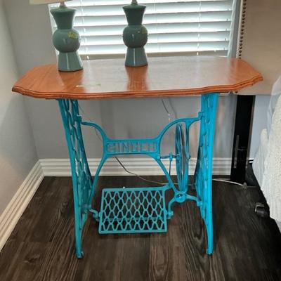 Singer sewing machine repurposed side table