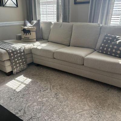 Bassett sleeper sofa with chaise, excellent condition.  Sleeper was never used.  