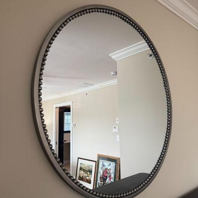 Round beaded metal framed mirror