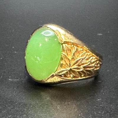 Men's jade ring on 14k gold setting