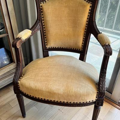 Carved Walnut Upholstered Armchair