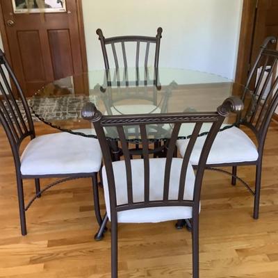 Glass table top with 4 chairs