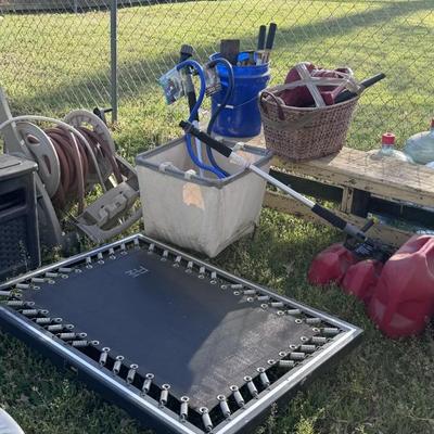 Trampoline, hose sprinklers