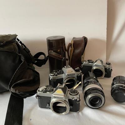 3 Nikon Cameras With Lens 