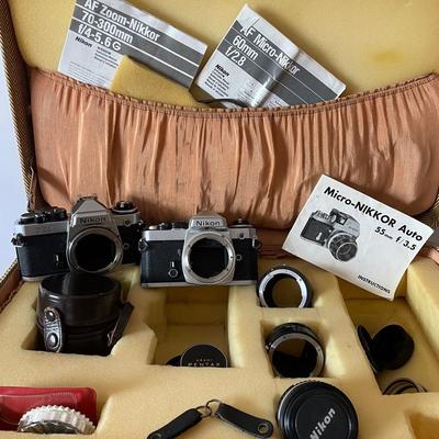 Nikon Cameras In Case With Lens