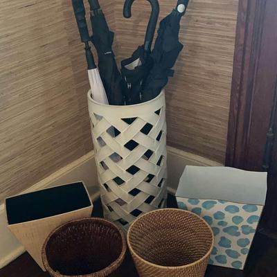 Umbrella  Stand With Several  Umbrellas And Four Waste Paper Containers 